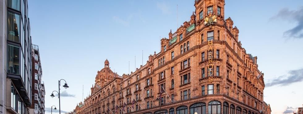 Exterior view of Harrods near The Londoner Hotel