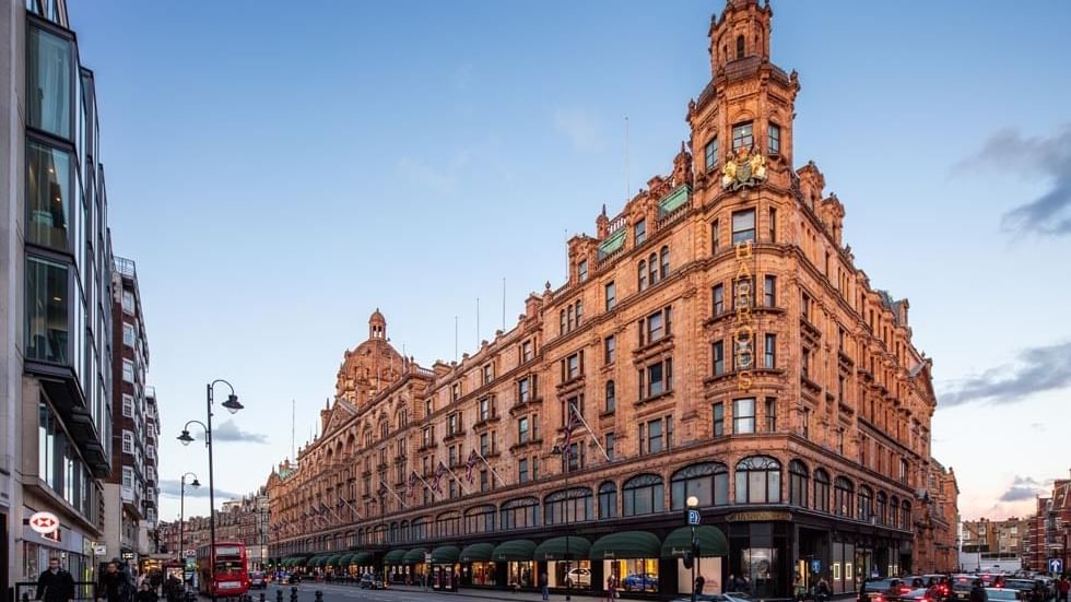 Exterior view of Harrods near The Londoner Hotel