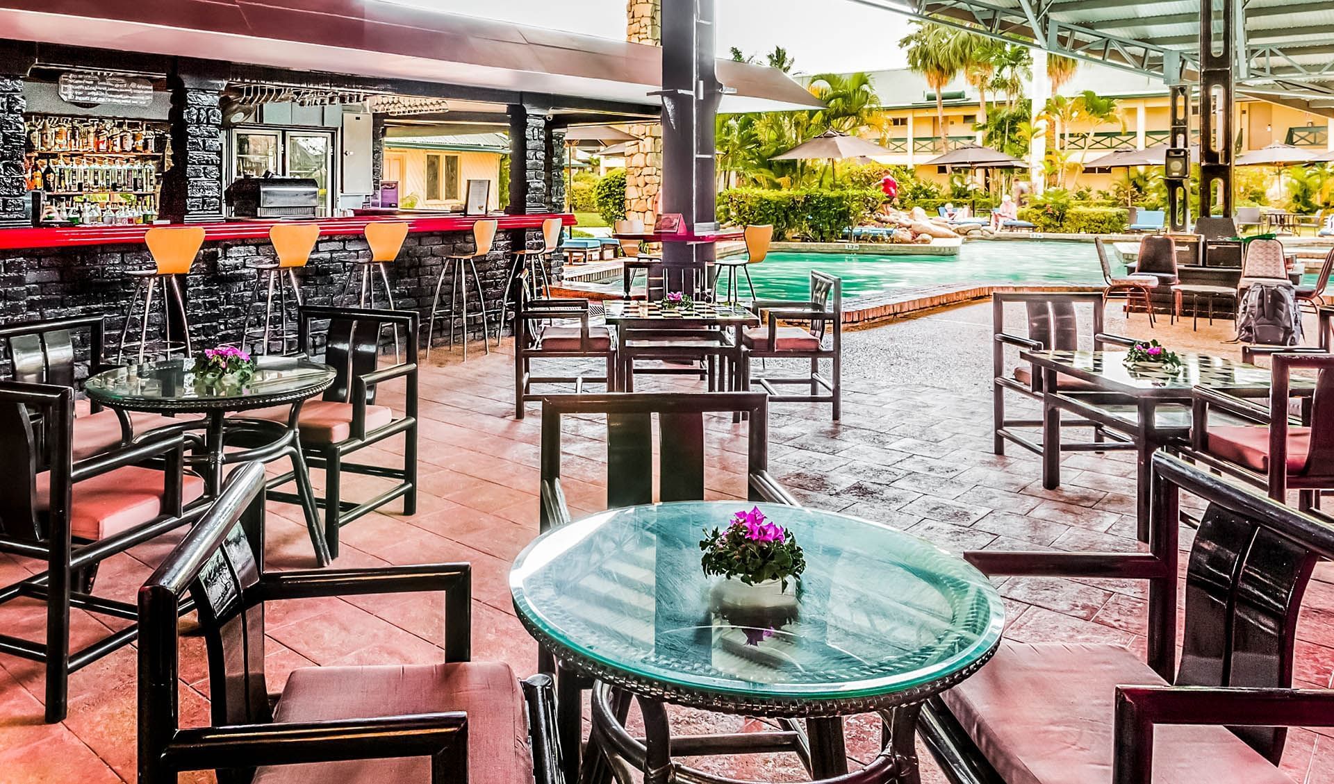 Seating arrangements in Poolside Bar at Tokatoka Resort