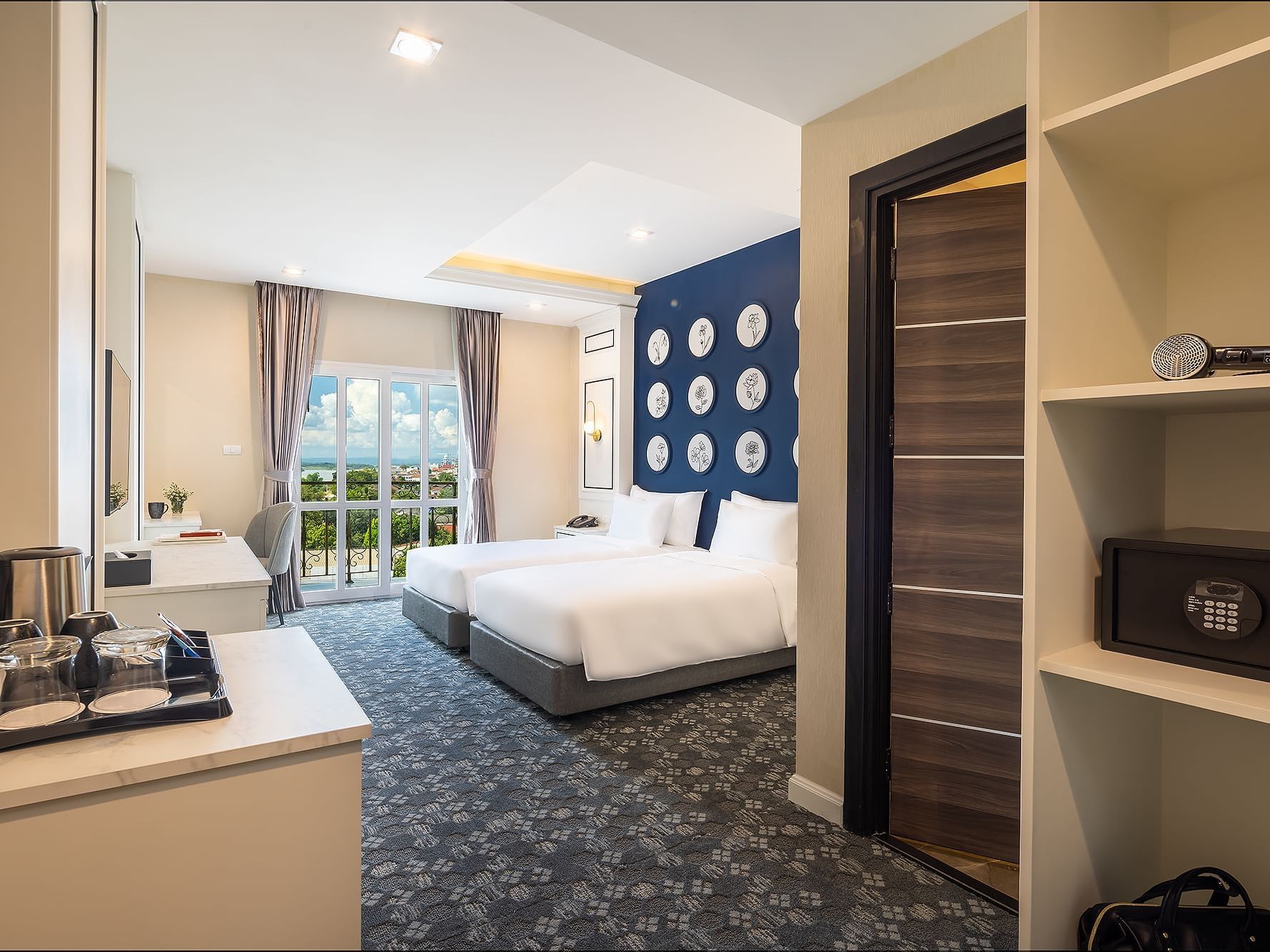 Coffee tray & working desk by the twin beds in a Room at Eastin Vientiane Laos