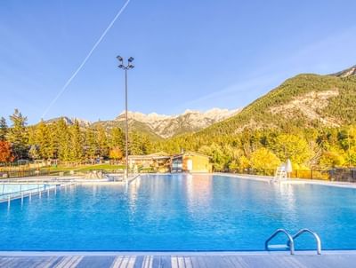 Outdoor swimming pool area at Fairmont Hot Springs Resort