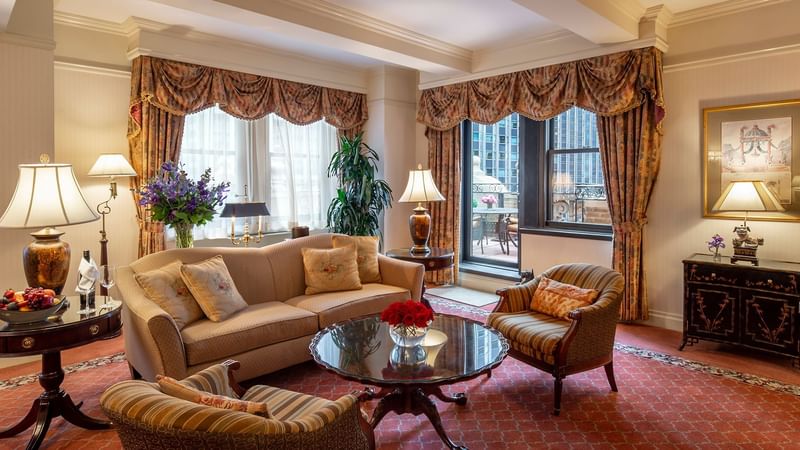 Living room and balcony in Suite of the Stars at Warwick New York