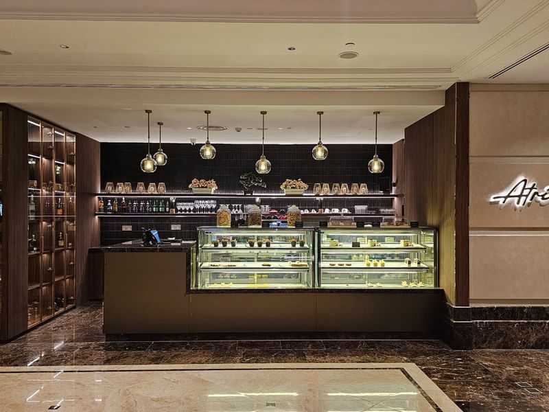 Patisserie with display cases of desserts in Atrium Lounge at Sunway Putra Hotel