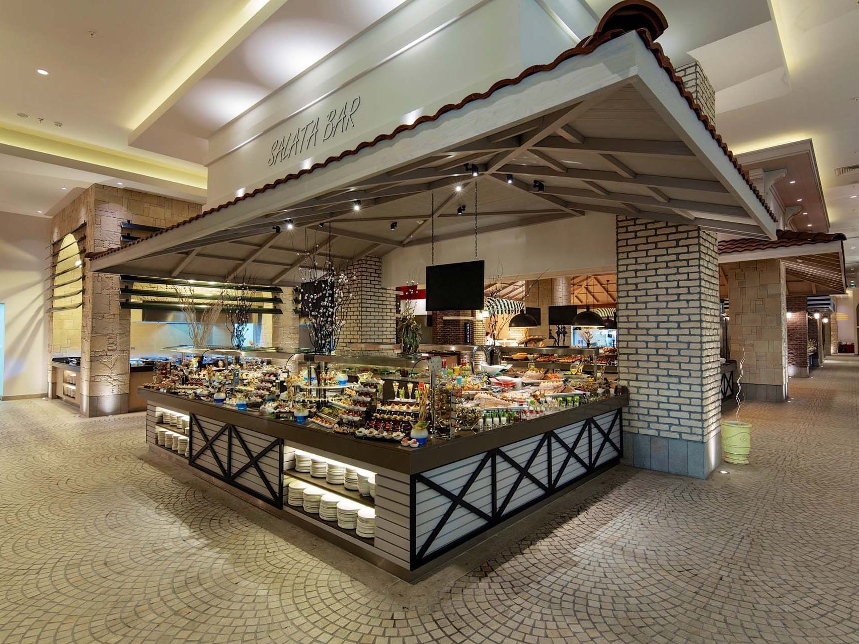 Buffet area and foods displayed on a food counter in Main Restaurant at Titanic Deluxe Golf Belek
