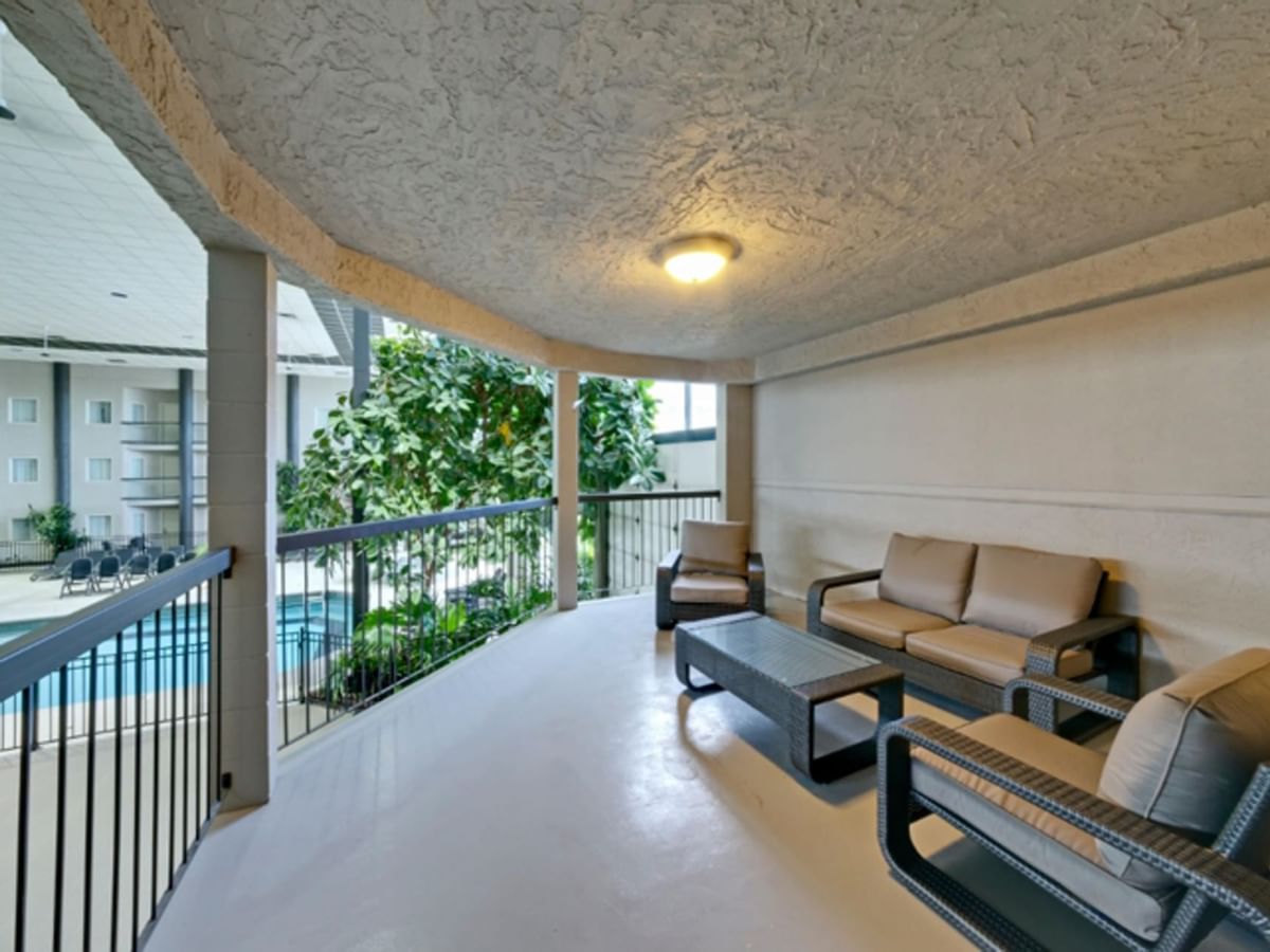 Chairs on balcony overlooking atrium