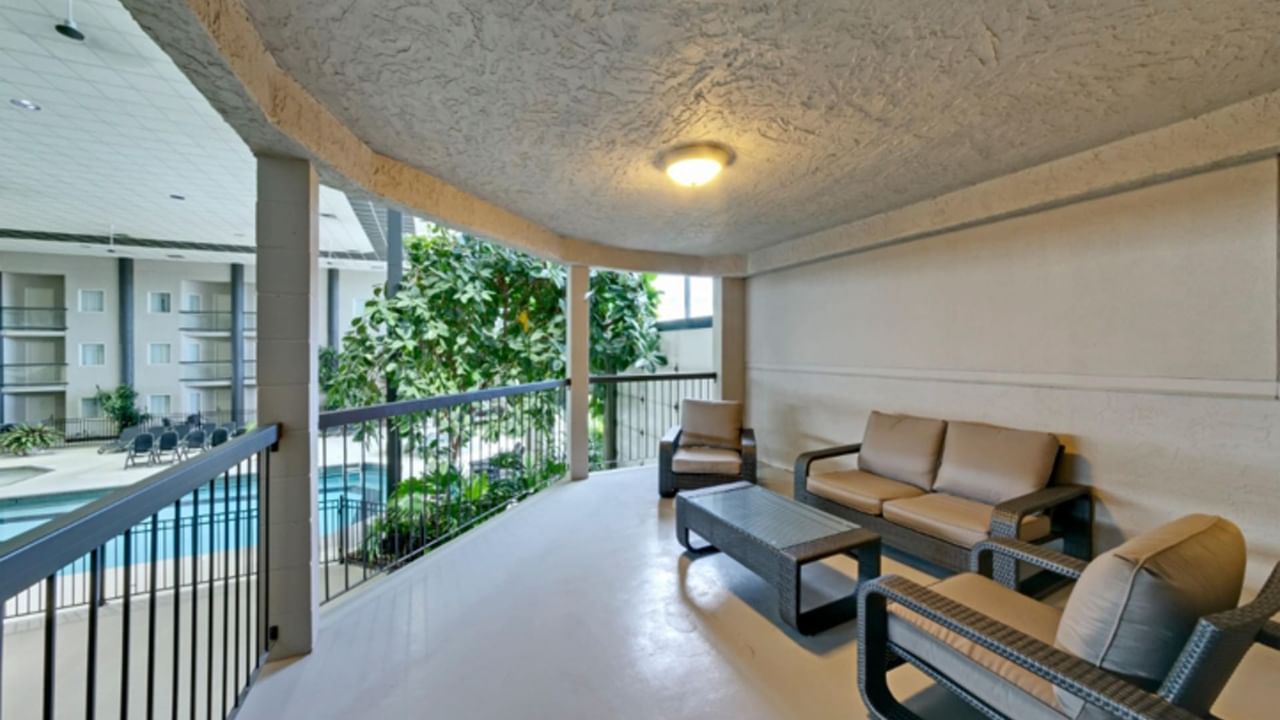 Chairs on balcony overlooking atrium