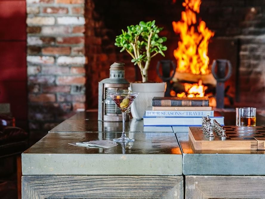 A cocktail on a marbled countertop at Heritage House Resort