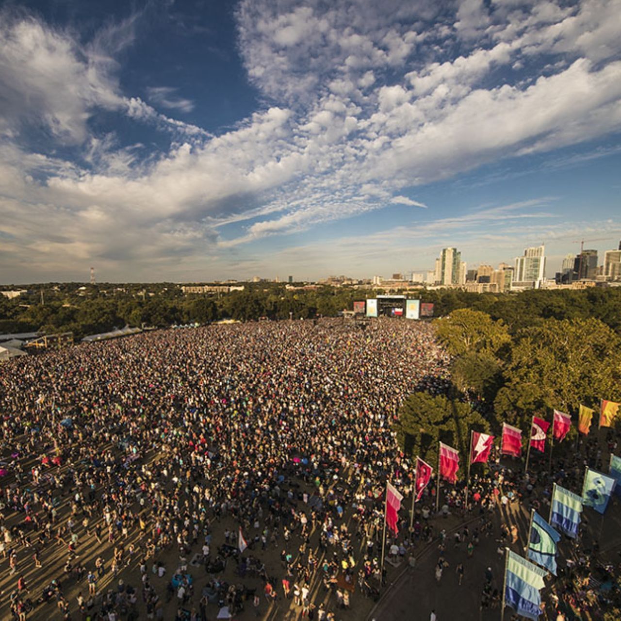 A large group of people at a concert near Austin Condo Hotel