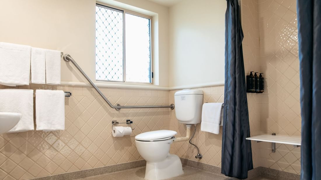 Accessible Bathroom with Shower Bench and Grab Rails