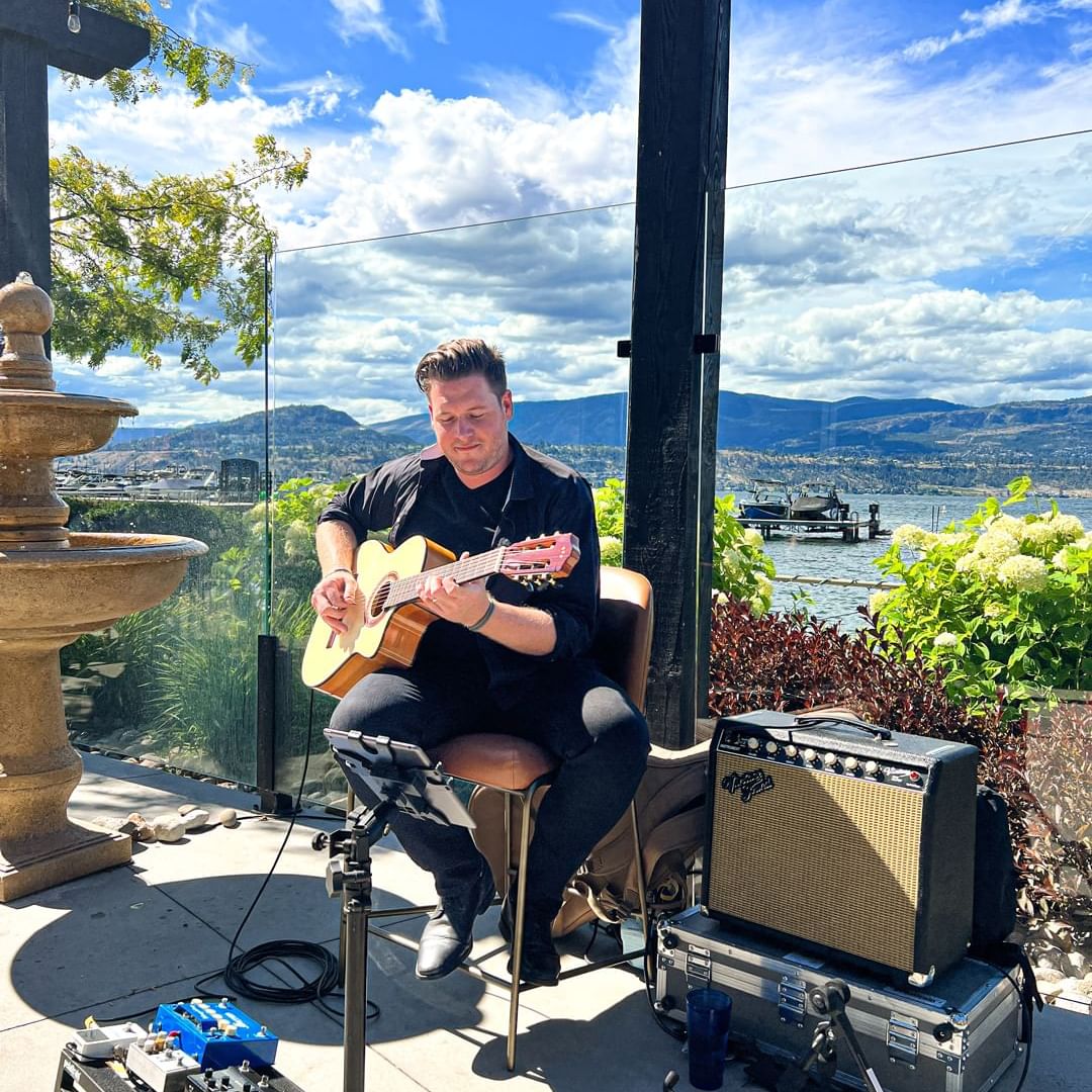 Guitarist playing guitar at Manteo Resort Waterfront