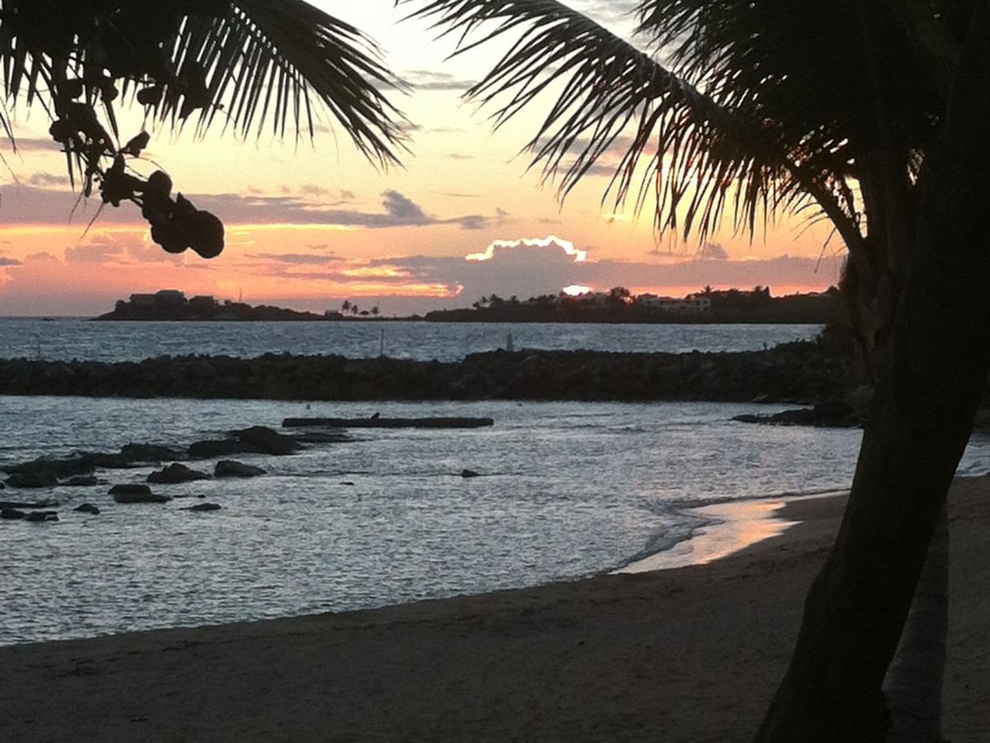 Sunset on beach at Tamarind Reef Resort 
