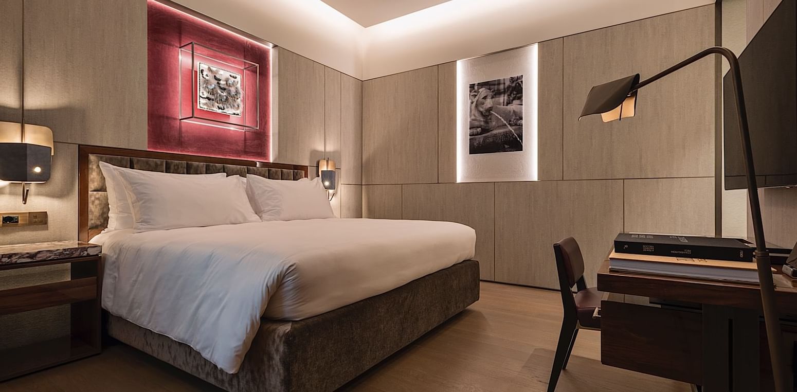 Comfortable bed in Junior Suite 6 at Fendi Private Suites