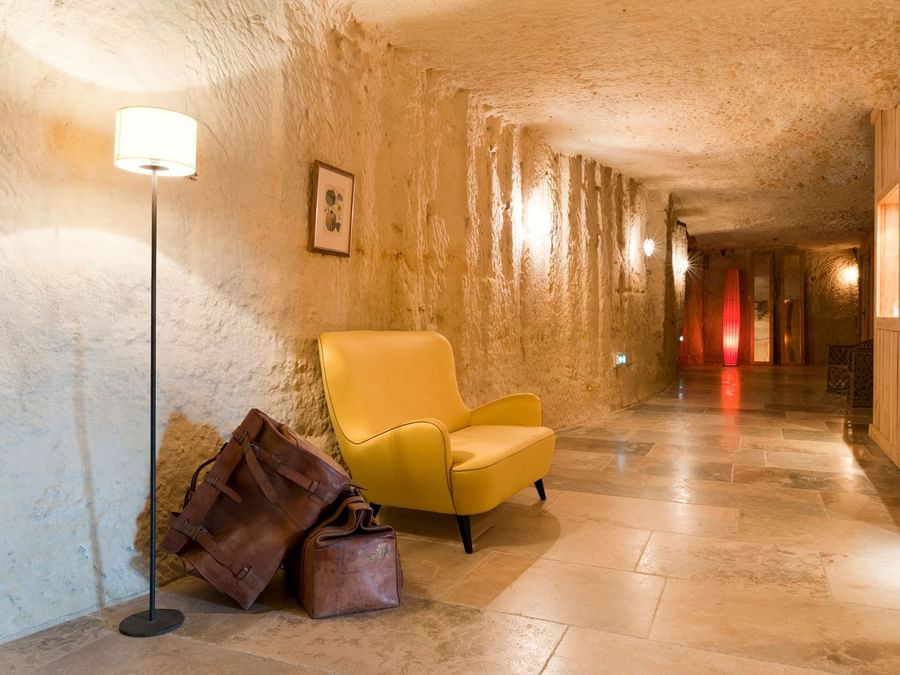 Sofa in a corridor area at Chateau de Perreux

