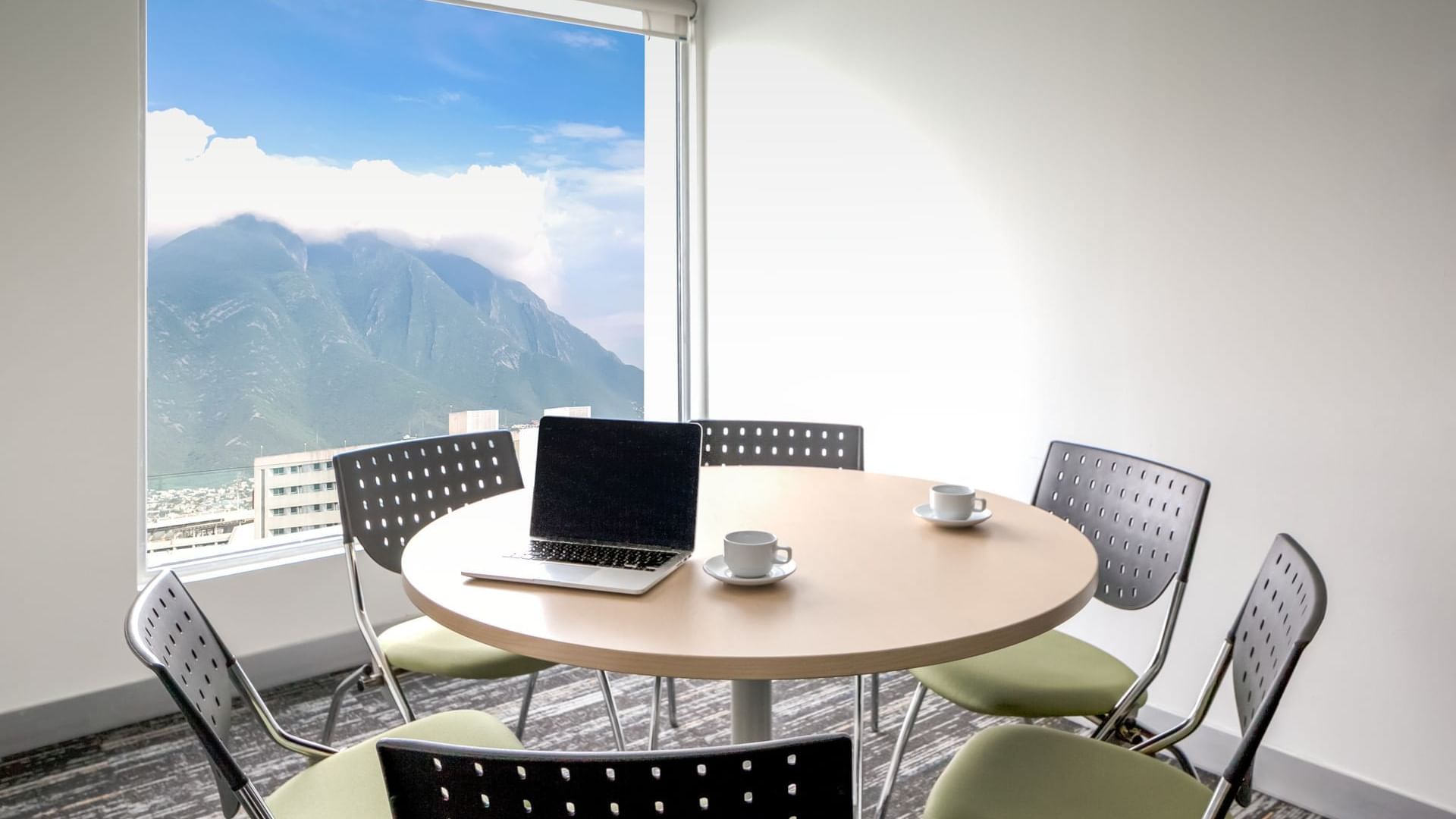 Table & mountain view in a Room at F I Monterrey Tecnológico