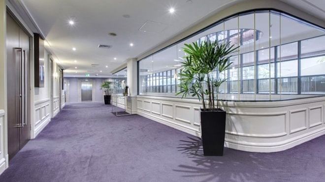 Largescale pre-function space with views of Sydney Hyde Park