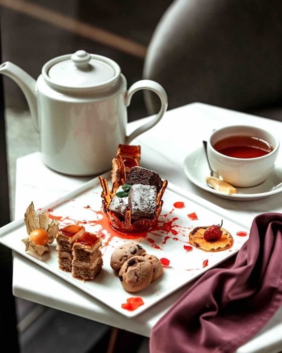 Black tea served with Lucious sweet treats at The Danna Langkawi