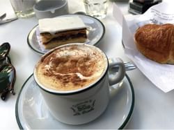 Hot chocolate & snacks in Café la Biela near Grand Hotels Lux