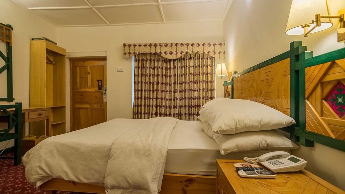 King bed in Standard Room at Hunza Baltit Serena Inn