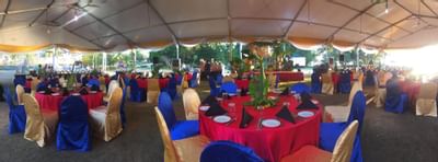 An outdoor area arranged for a wedding reception