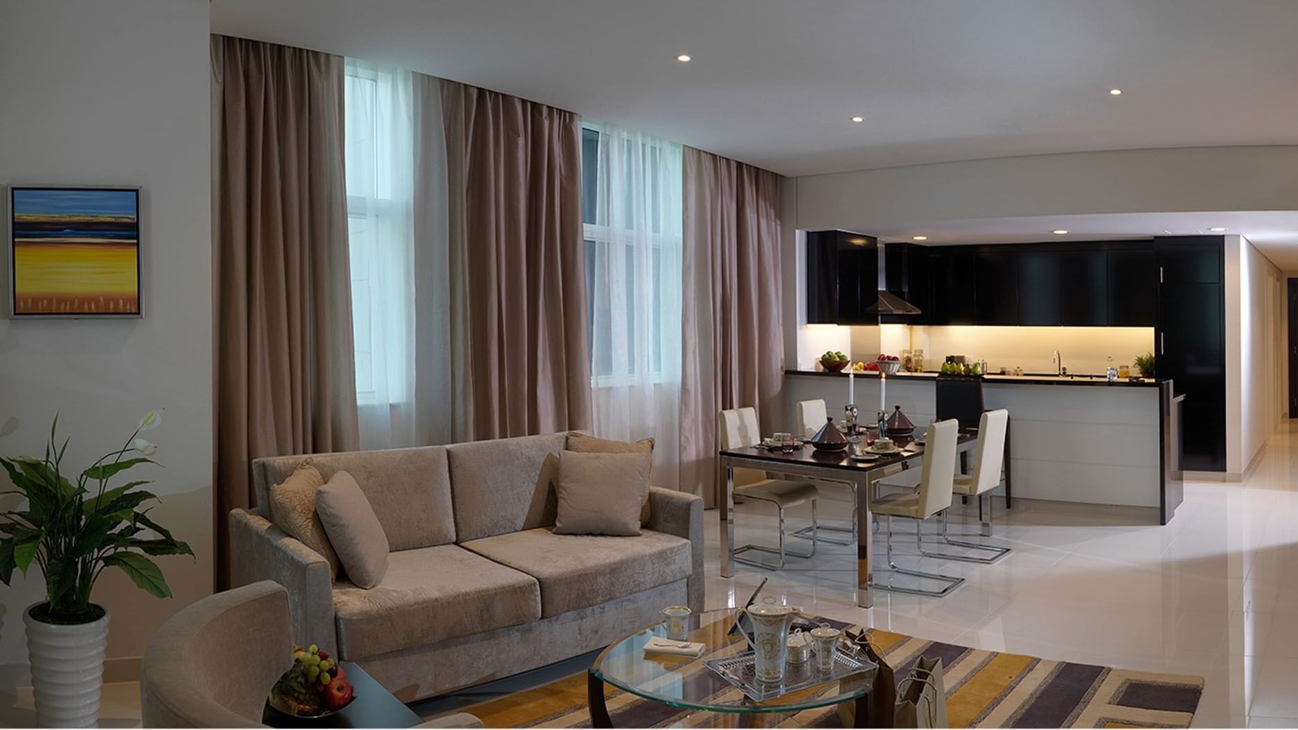 Elegant living room featuring modern furniture in Two Bedroom Suite at DAMAC Maison Cour Jardin