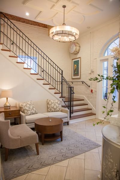 Loungers by the lobby's stairway at Hotel St. Pierre