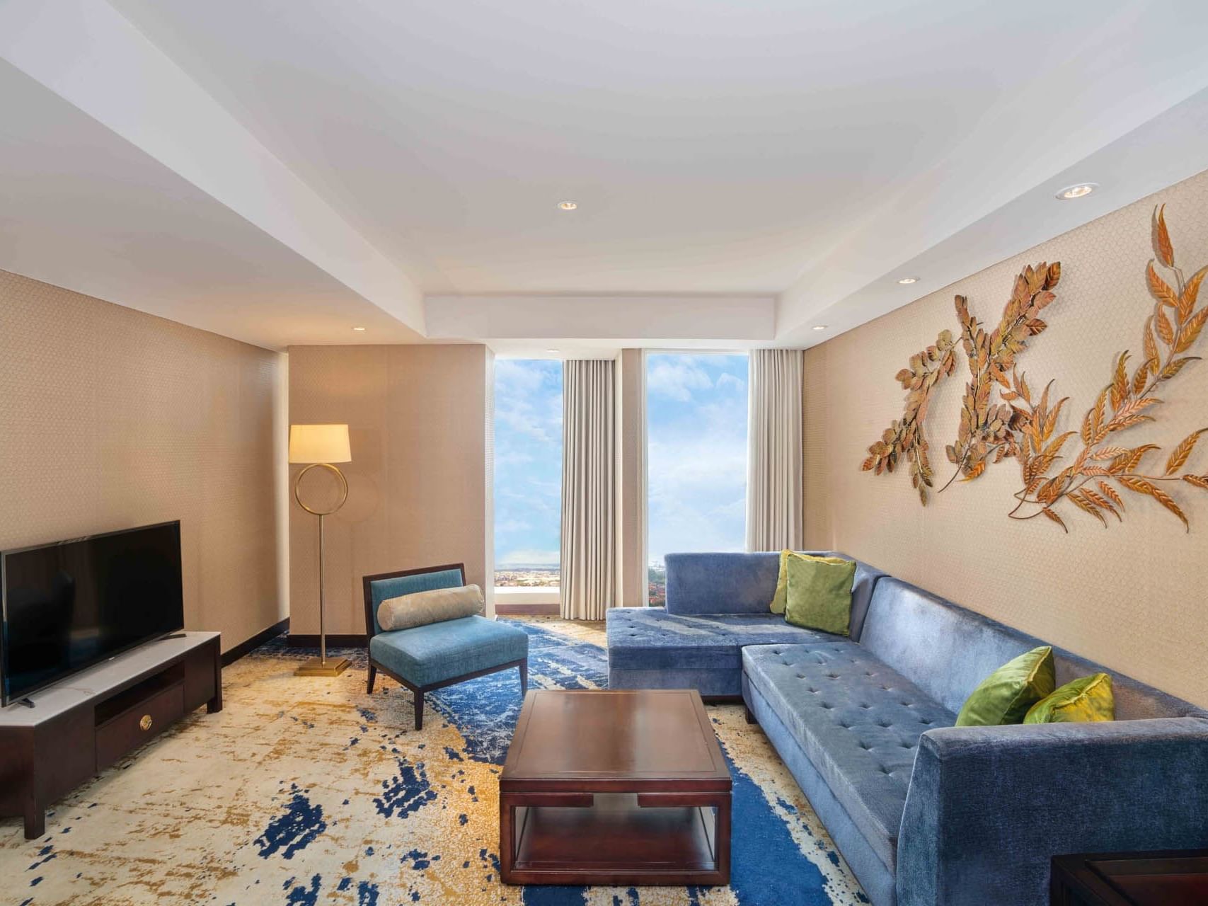 Sofa & TV in Living area of Breccia suite, Vasa Hotel Surabaya