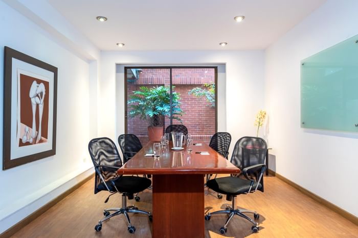 U-shaped table setup of a meeting room at 3C Hotels