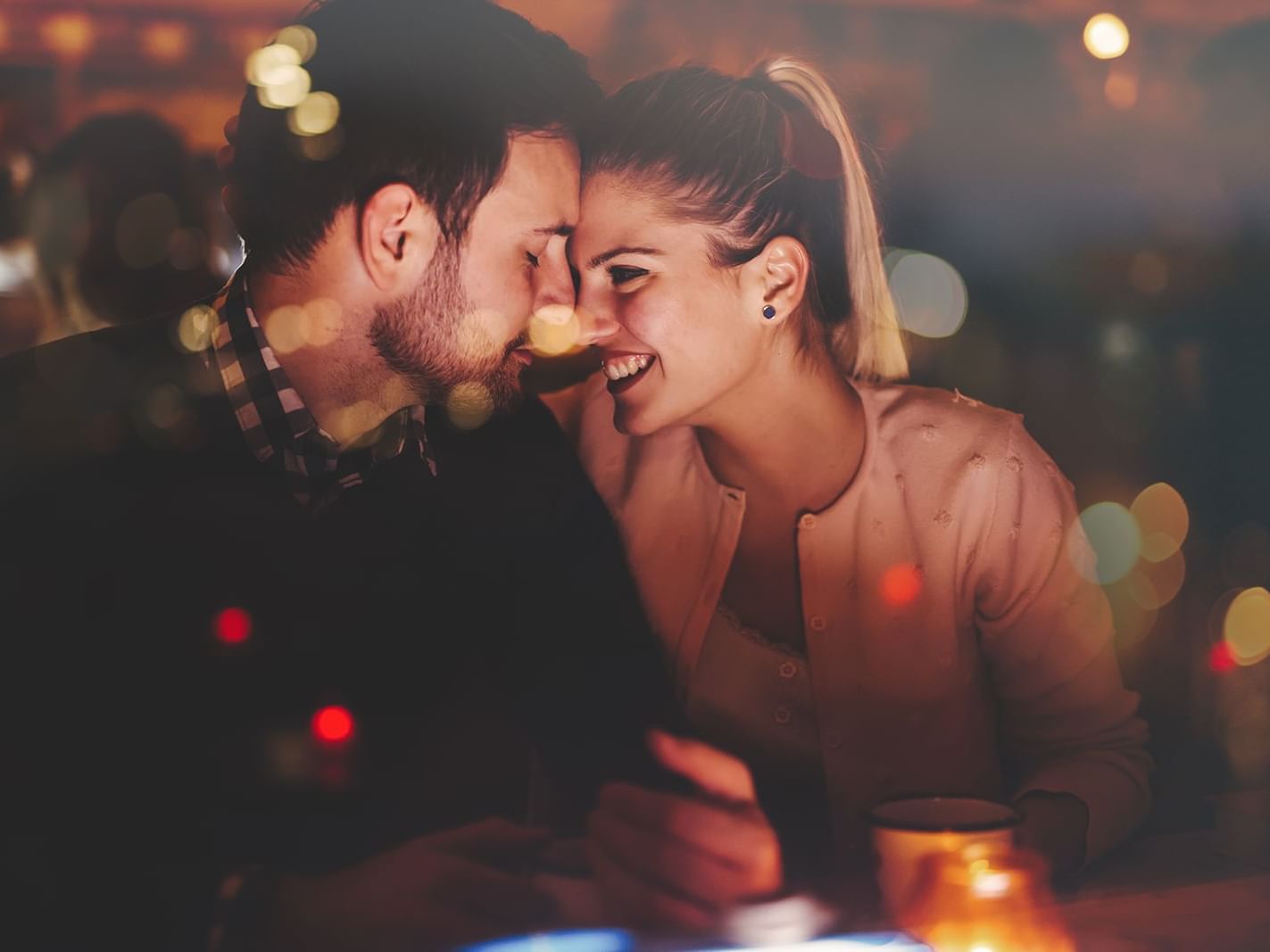 Happy couple enjoying dinner.