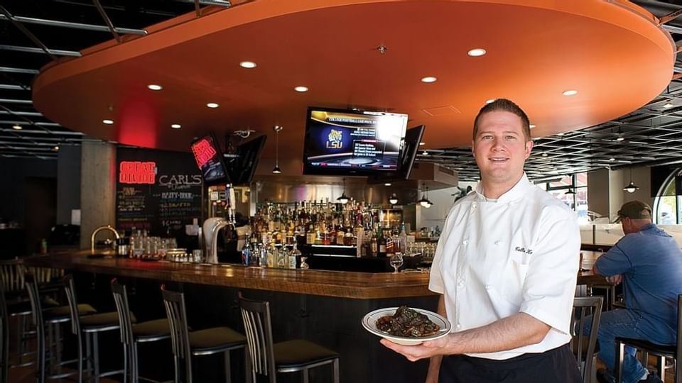 Waiter in Carl's Tavern at Legacy Vacation Resorts