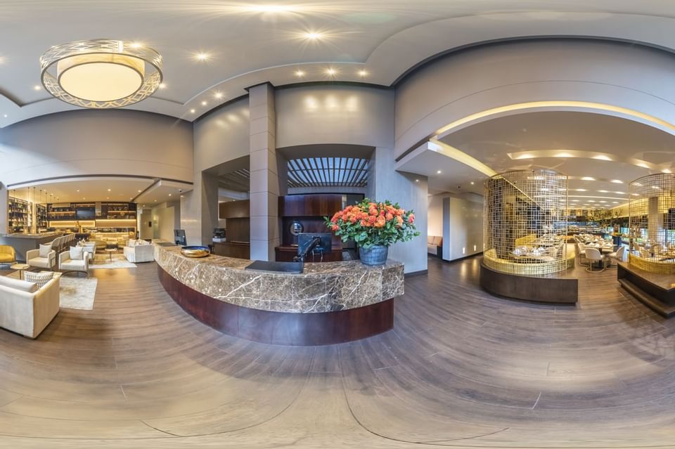 Panoramic view of the interior of lobby at Blue Doors Hotels