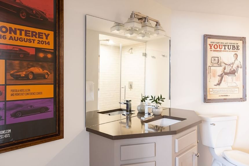 Bathroom with vanity & mirror in Superior Loft at Retro Suites Hotel