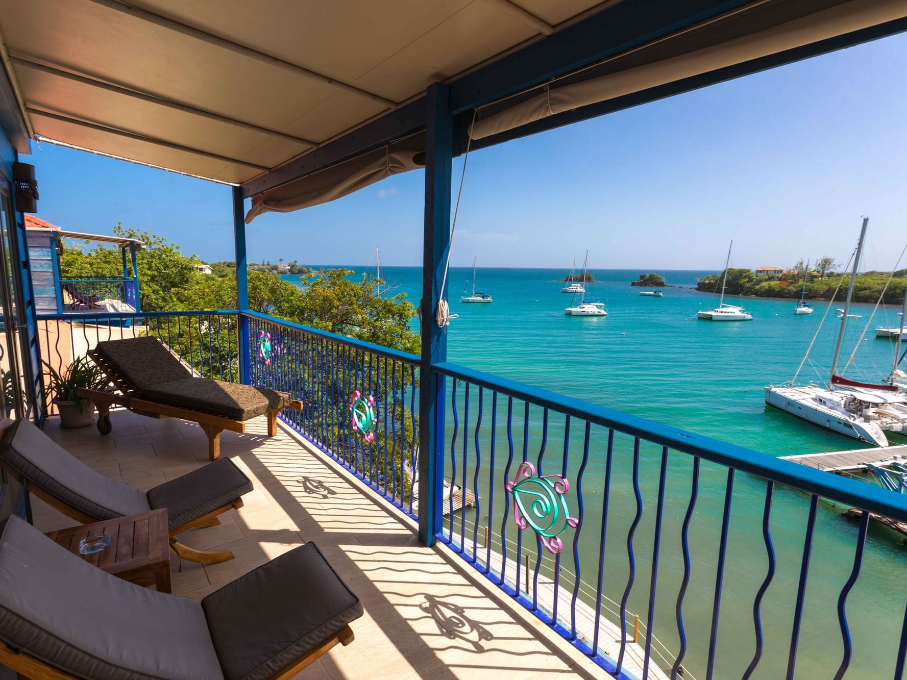 Balcony lounge in Water Front Suite at True Blue Bay Resort