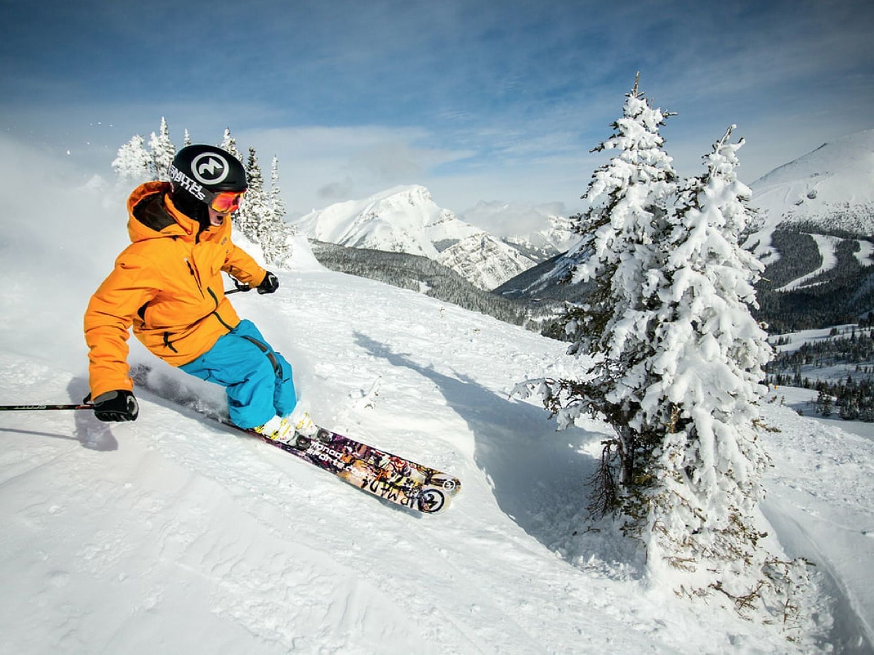 A man skiing down a mountain near Blackstone Mountain Lodge