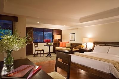 Lounge area & work desk by the bed in Cabanas at York Hotel Singapore