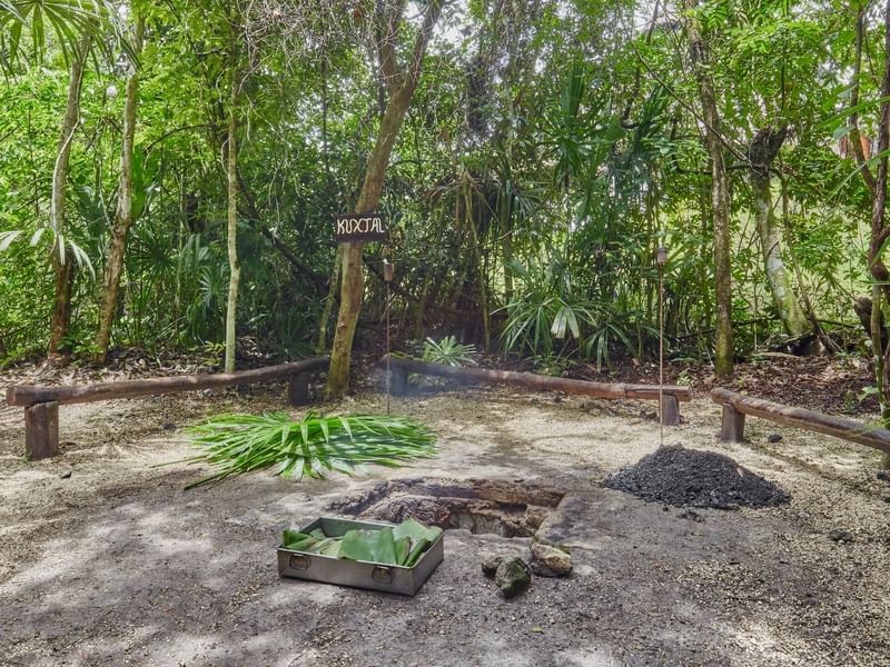 Campfire set-up with a lounge at The Explorean Resorts