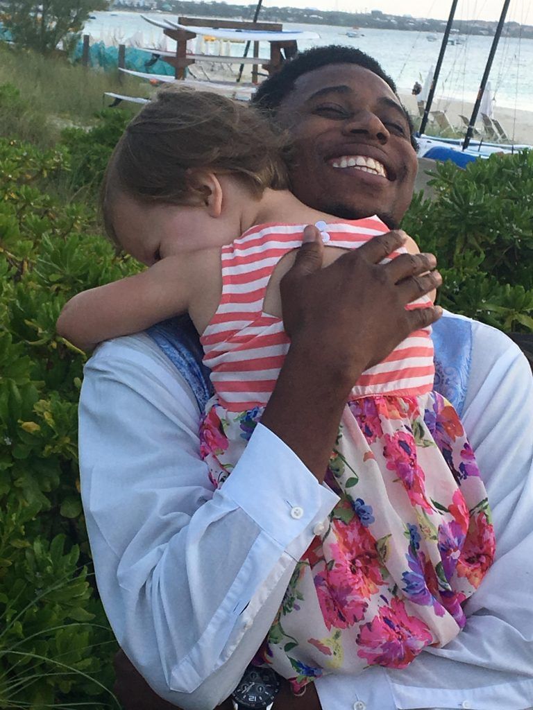 Father hugging her daughter at The Somerset on Grace Bay
