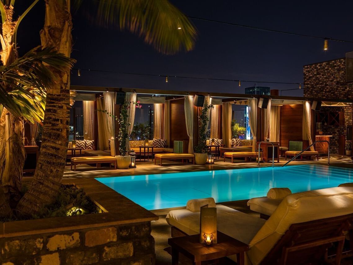 Highlight room with pool night time view Dream Hollywood