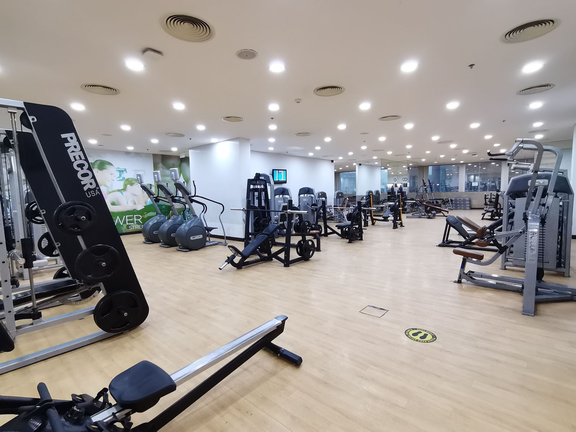 Interior of the fitness center at Two Seasons Hotel & Apt