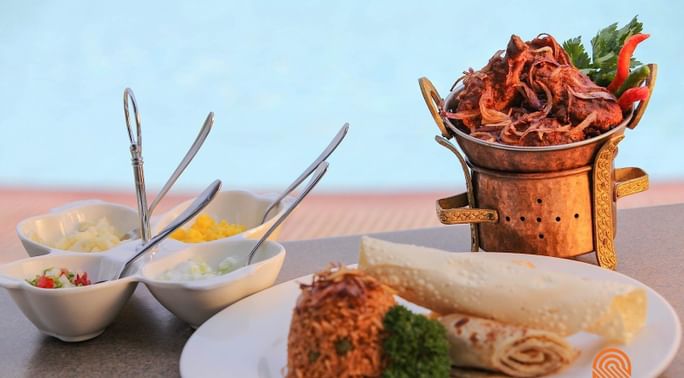 Closeup of a dish served by room service at Kivu Serena Hotel
