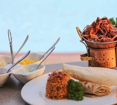Closeup of a dish served by room service at Kivu Serena Hotel