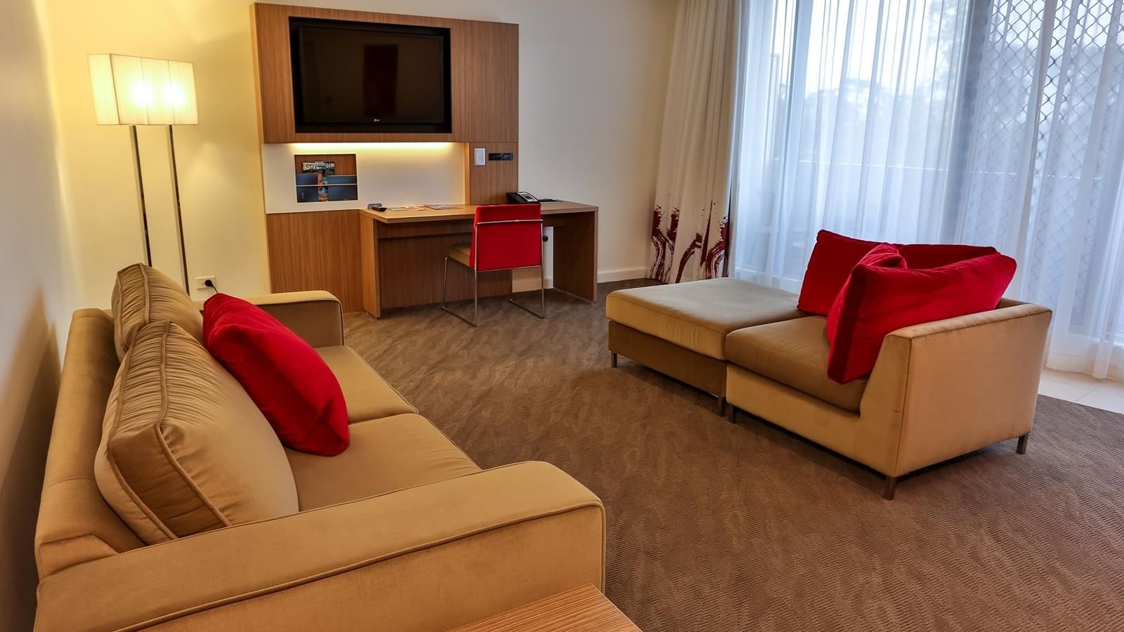 Living area of 1 Bedroom Apartment with sofas at Novotel Sydney