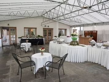 Banquet Terrace with buffet table at La Tourelle Hotel and Spa