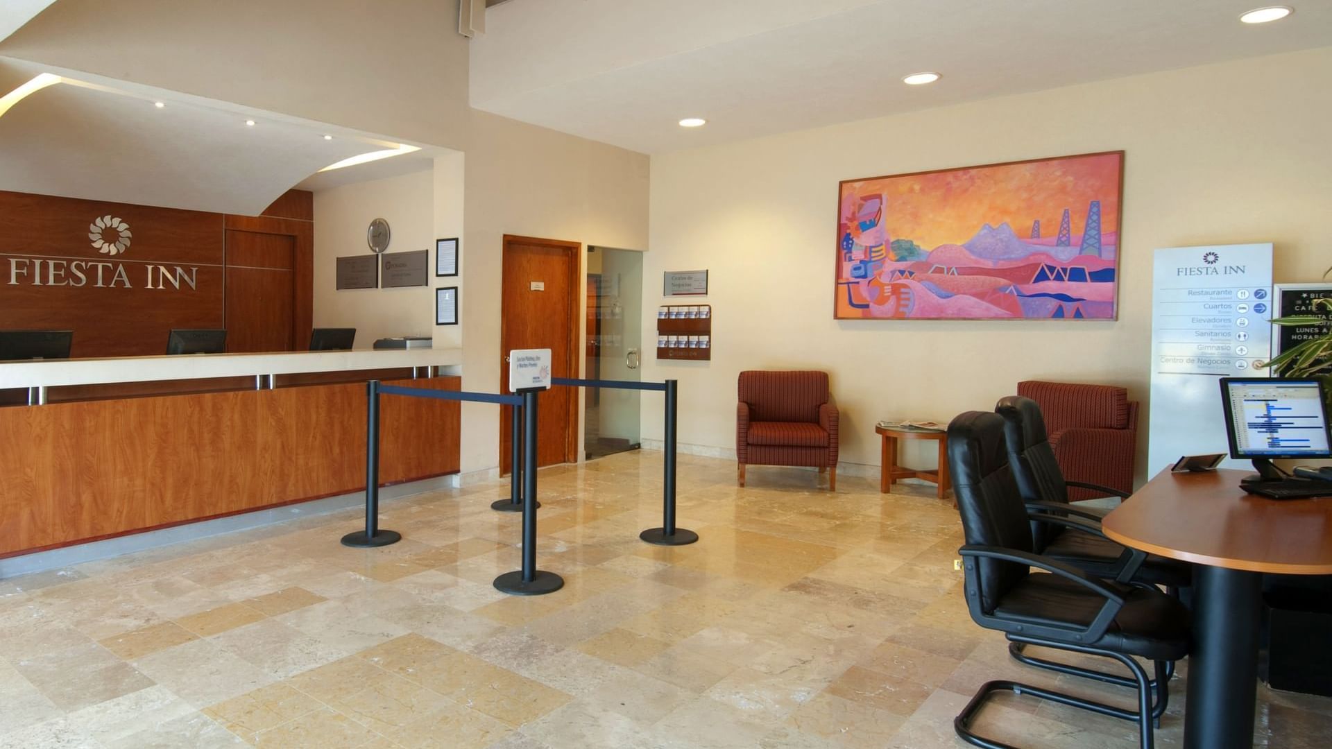 Lobby & reception area with work desks at FI Poza Rica