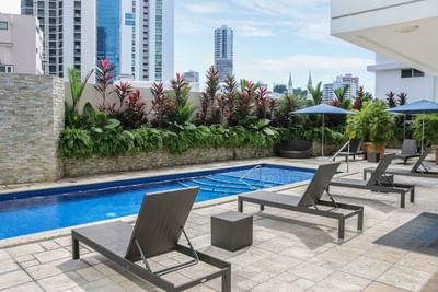 pool with lounge chairs