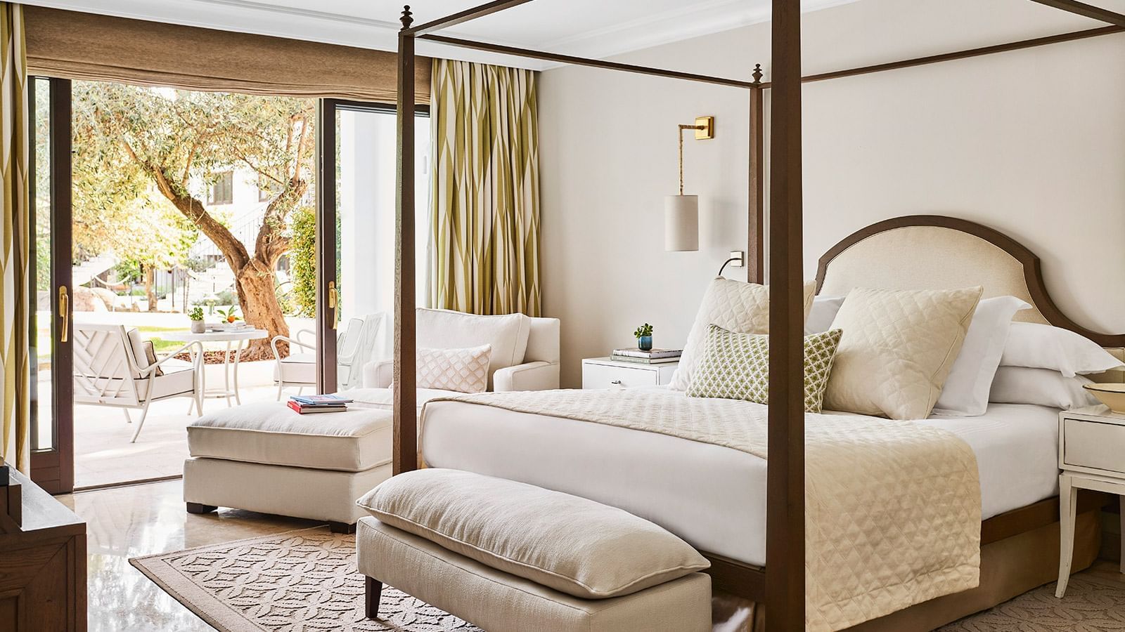 Bed & furniture in a Junior Suite at Marbella Club