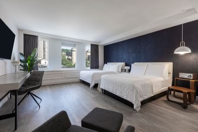Deluxe Two Double Beds with city view at SENS Hotel