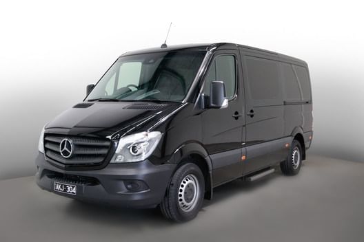 Exterior view of the twelve-seater van at Crown Hotels