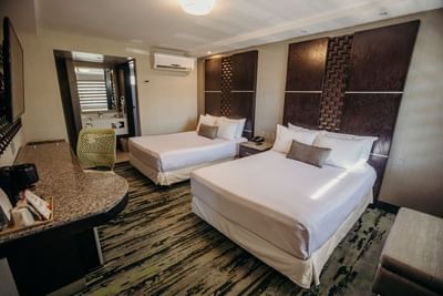 Double beds & TV in Superior room at Araiza Hotel Calafia