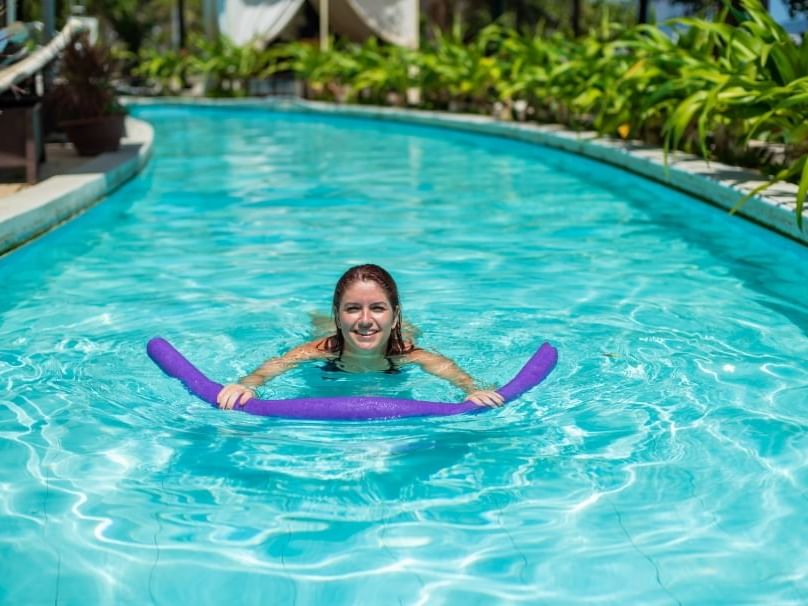 Lady in the Furman Aquatic Center pool, Gateway Hotel Ames