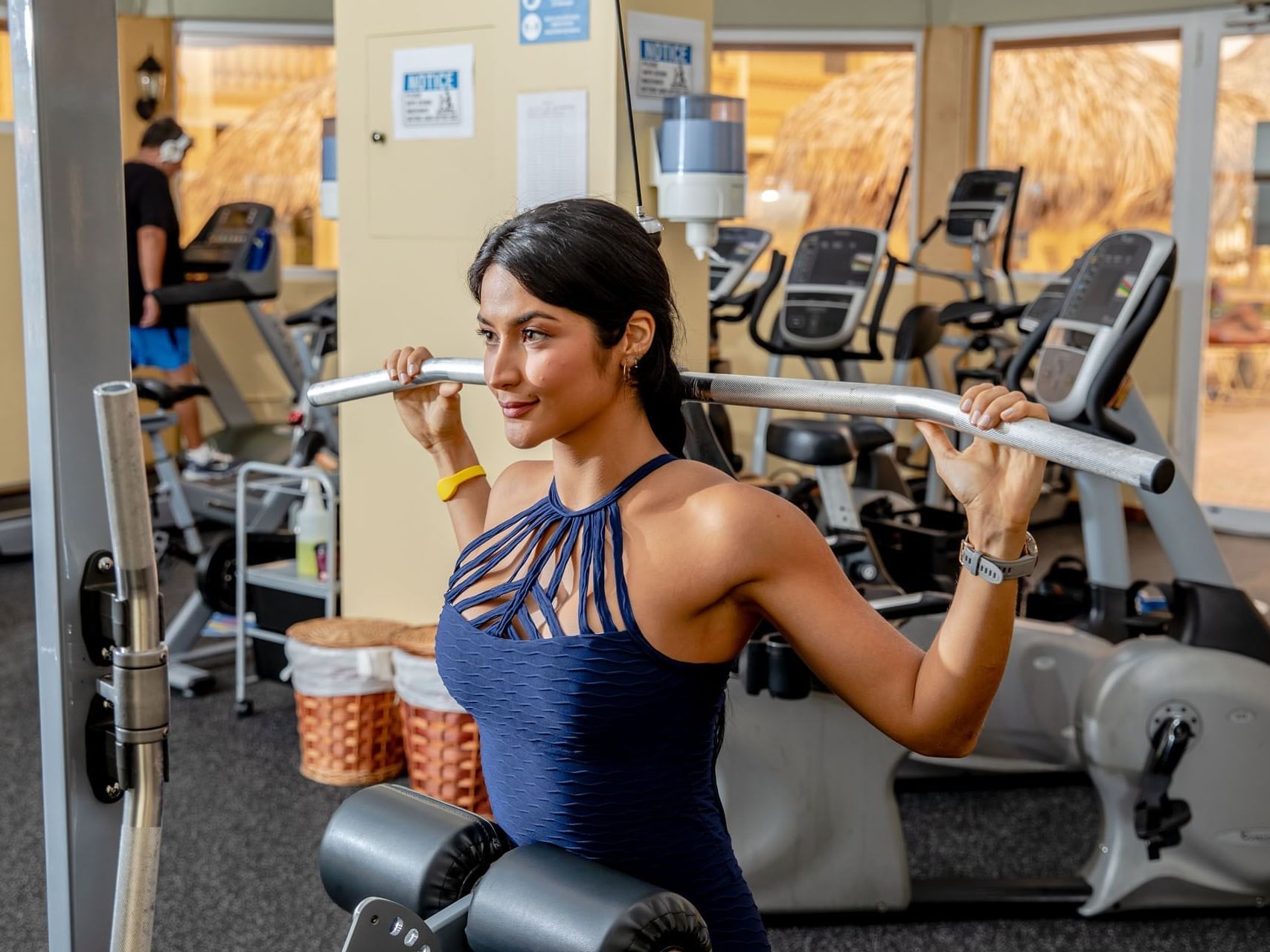 Young girl working out in the gym at Eagle Aruba Resort